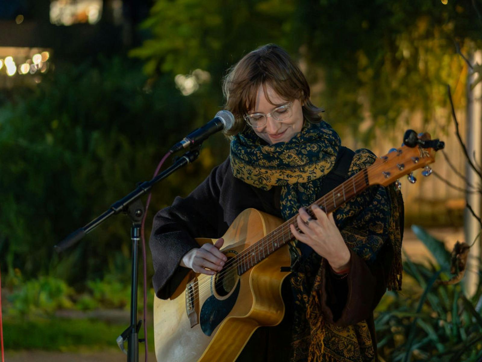A musician performs on guitar