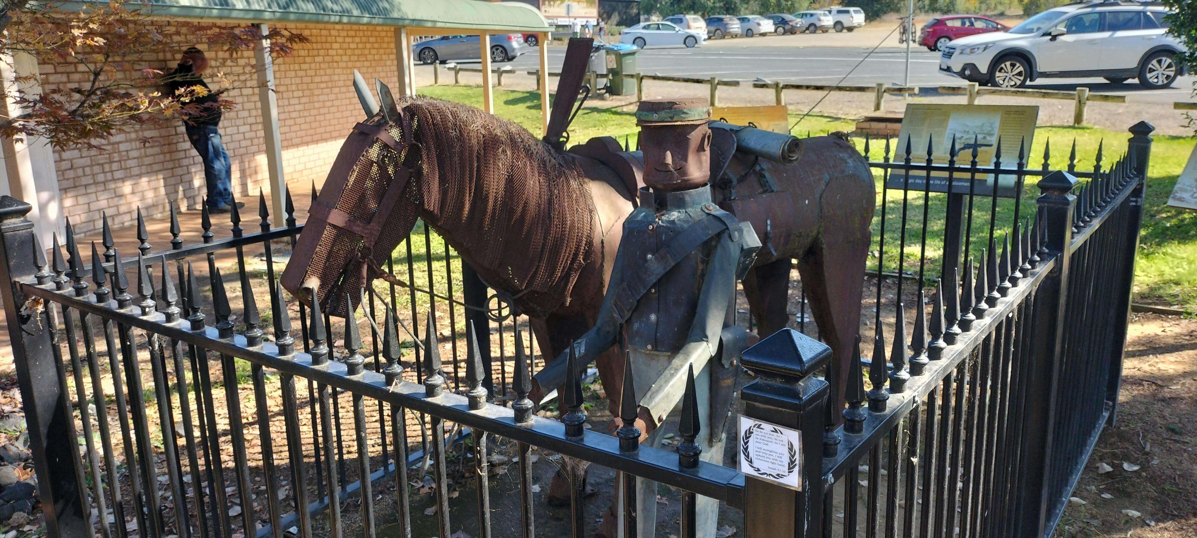 Fence around the metal-welded statue for Sgt Parry Memorial.