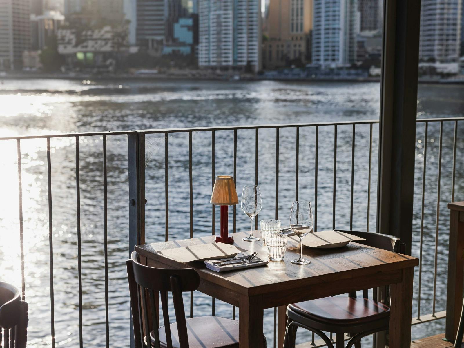 CIAO tables by the river