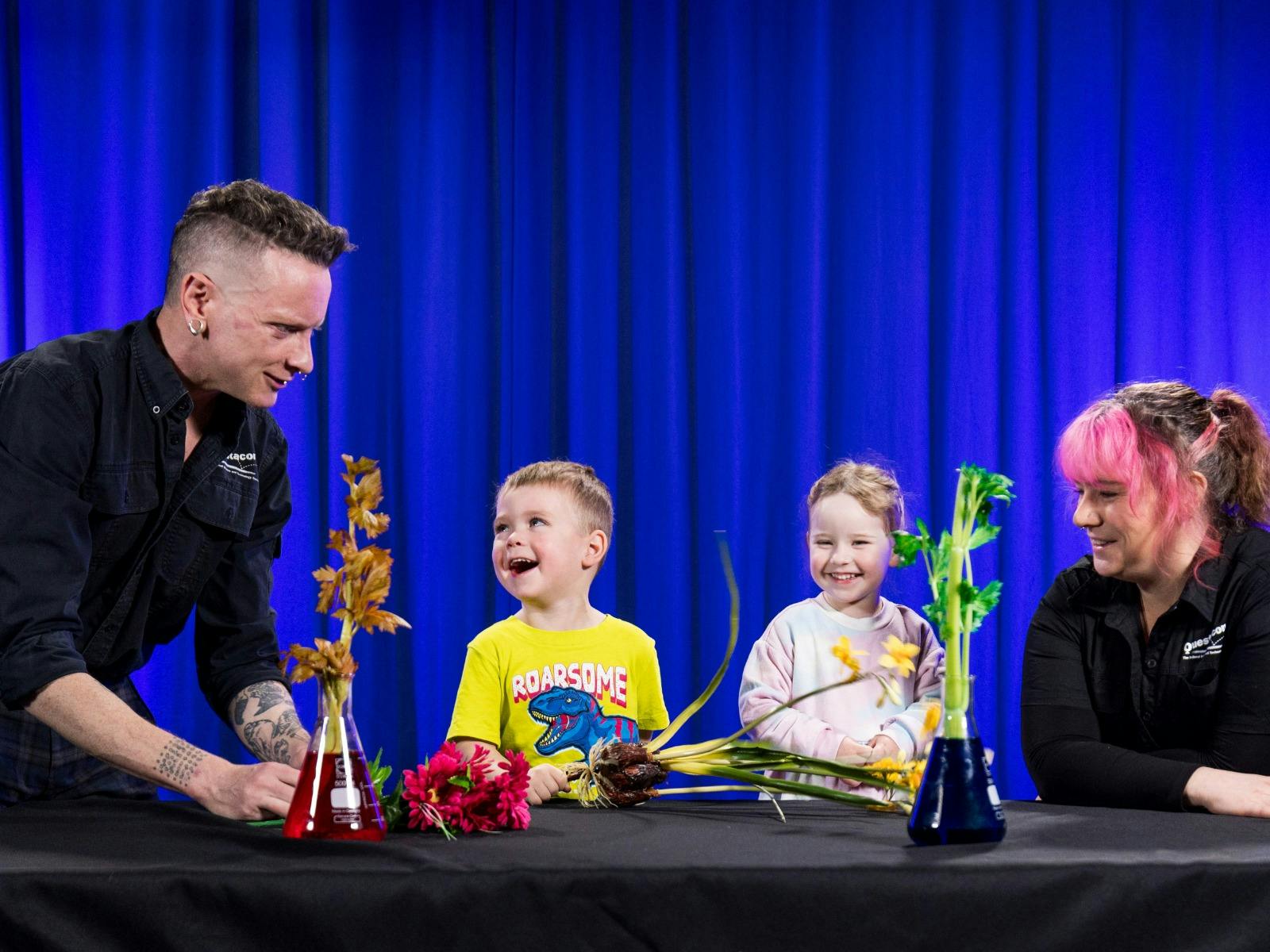 Two children learn about flowers at Science Time: Spring