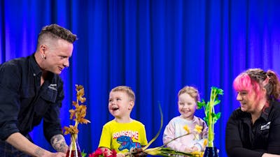 Two children learn about flowers at Science Time: Spring