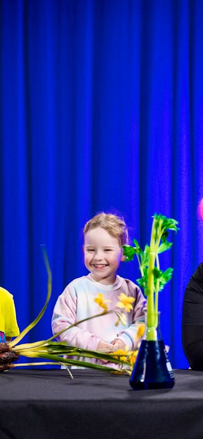 Two children learn about flowers at Science Time: Spring