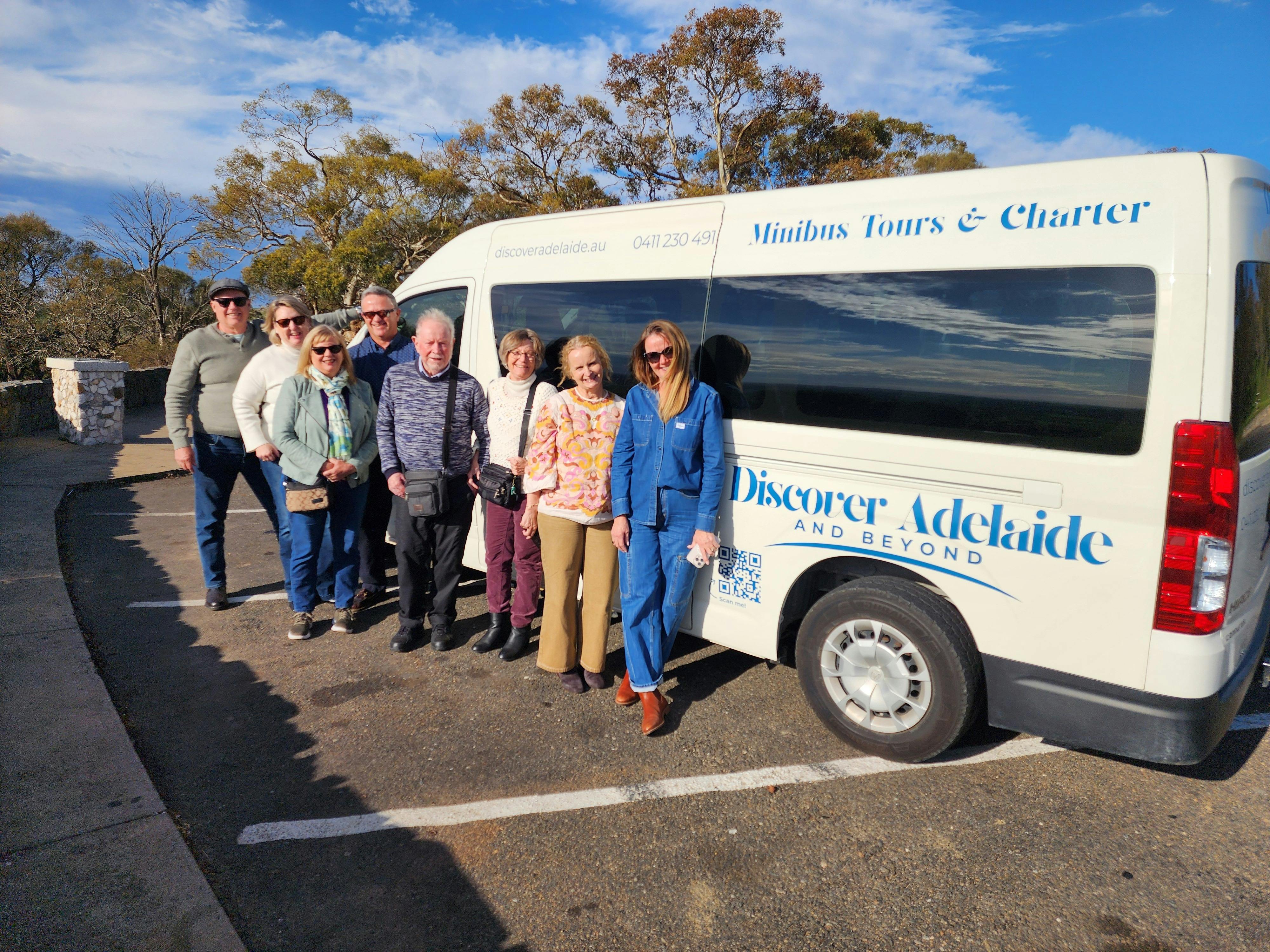 Tour group photo in front of the minibus