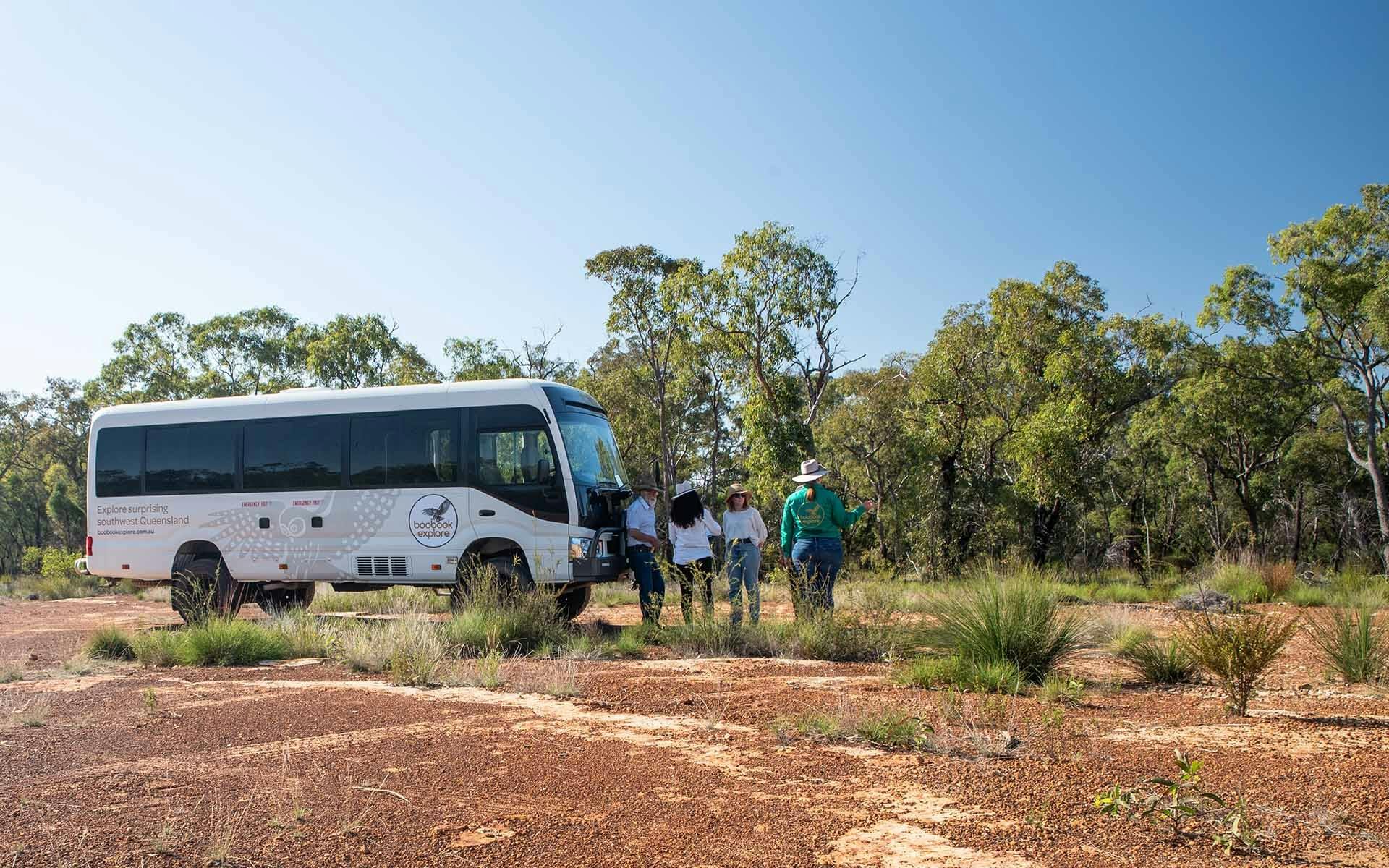 Guests standing next to the Boobook Explore bus at Gurulmundi