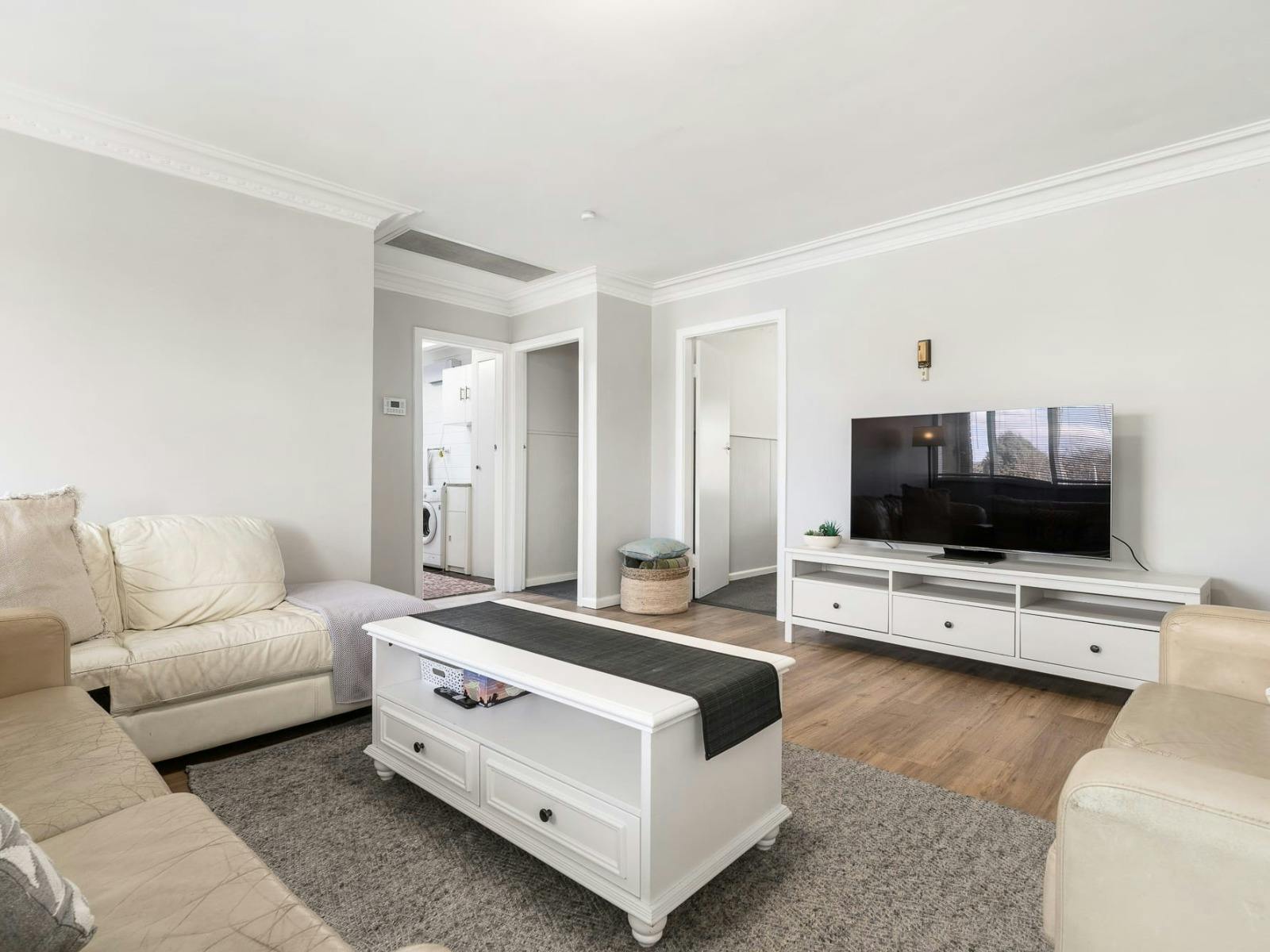 Large sofas with lots of space and a tv