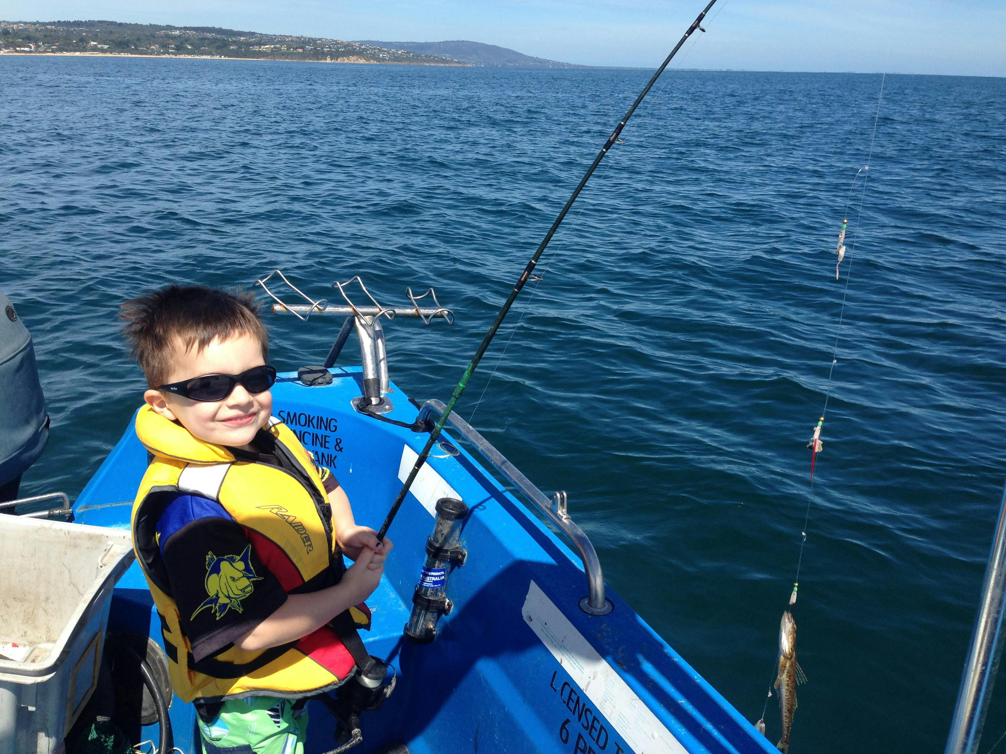 go boat fishing with the family at Mornington self drive fishing boat hire melbourne