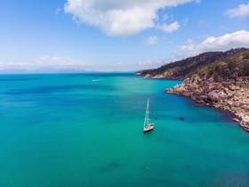 Pilgrim at anchor with views of the Magnetic Island coastline