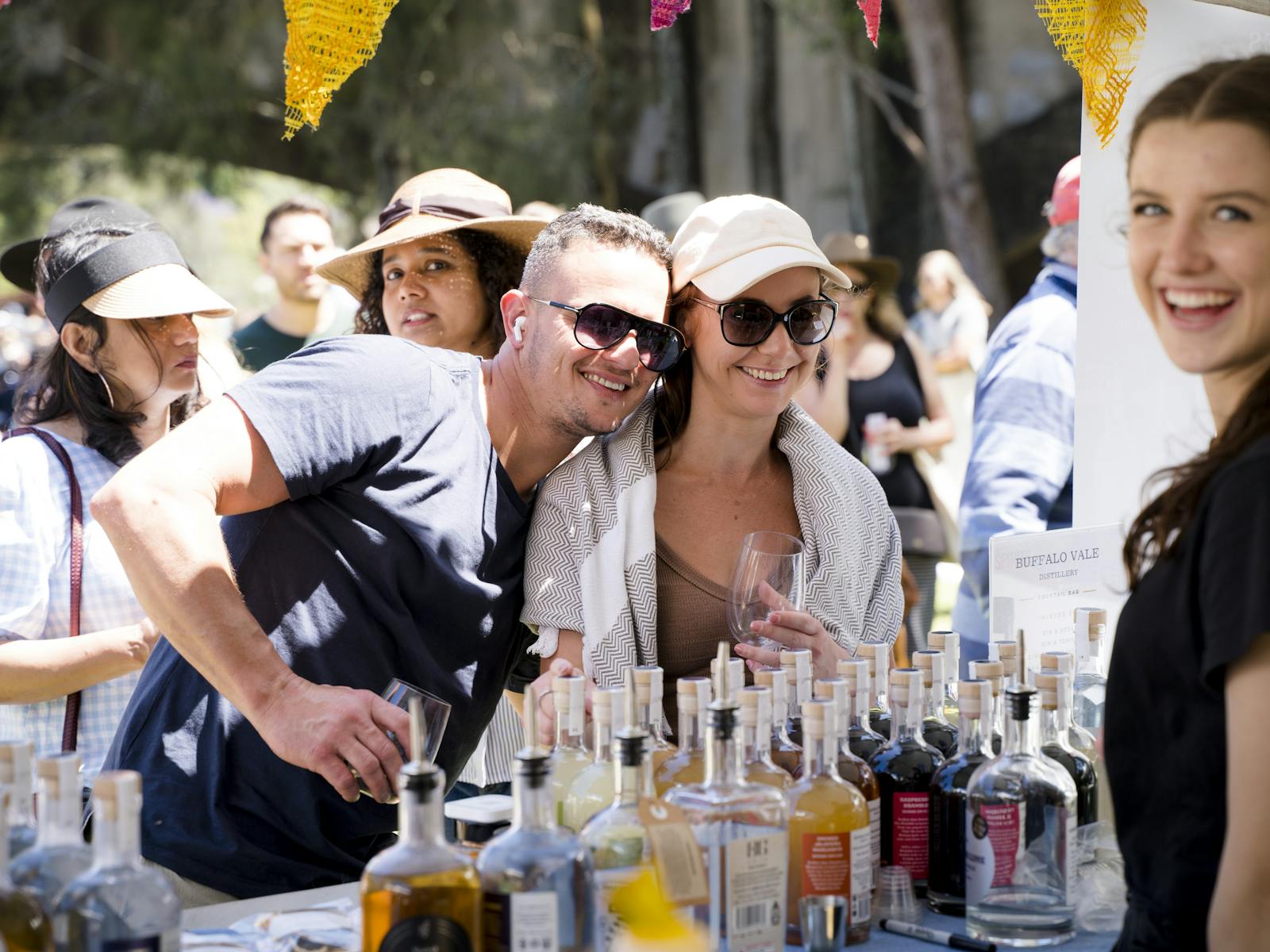 People smiling at outdoor bar