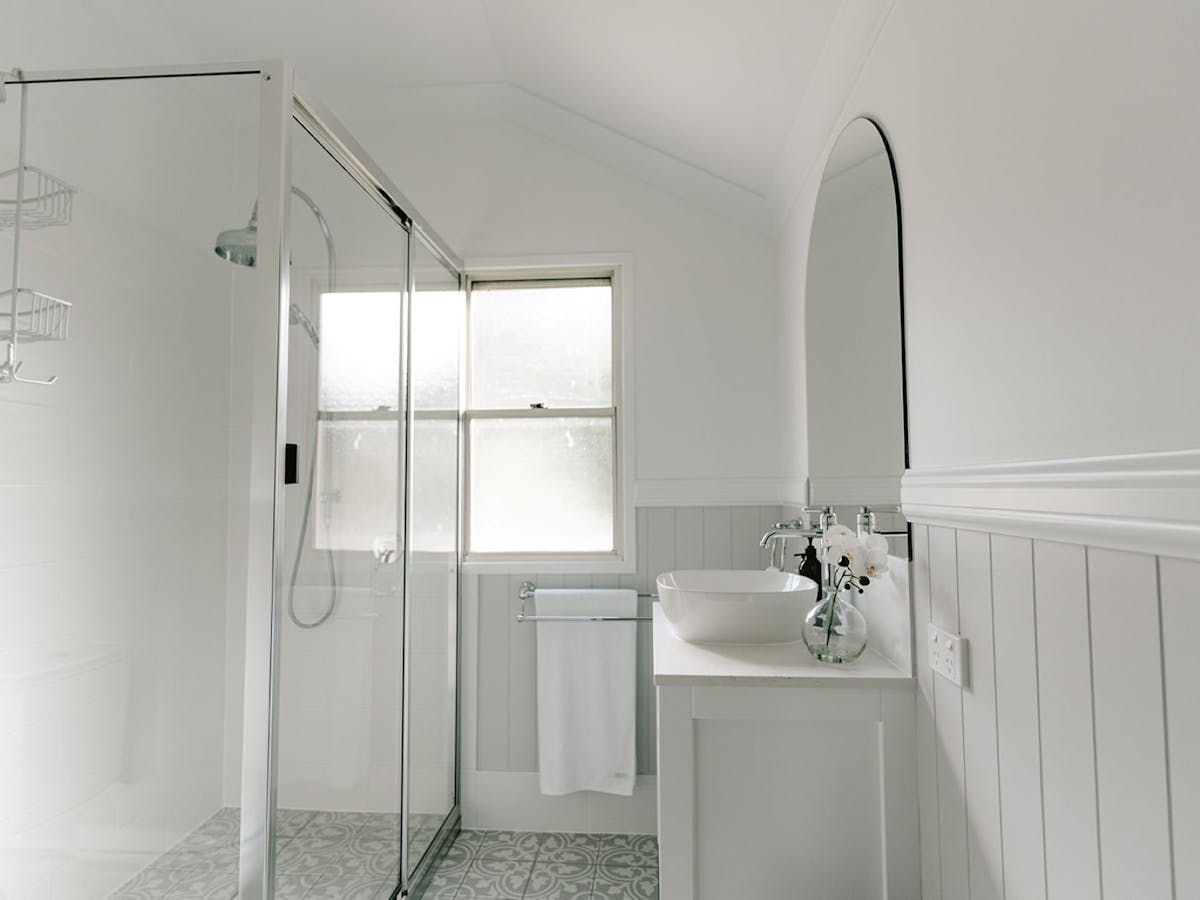 Well-appointed bathroom with rain shower