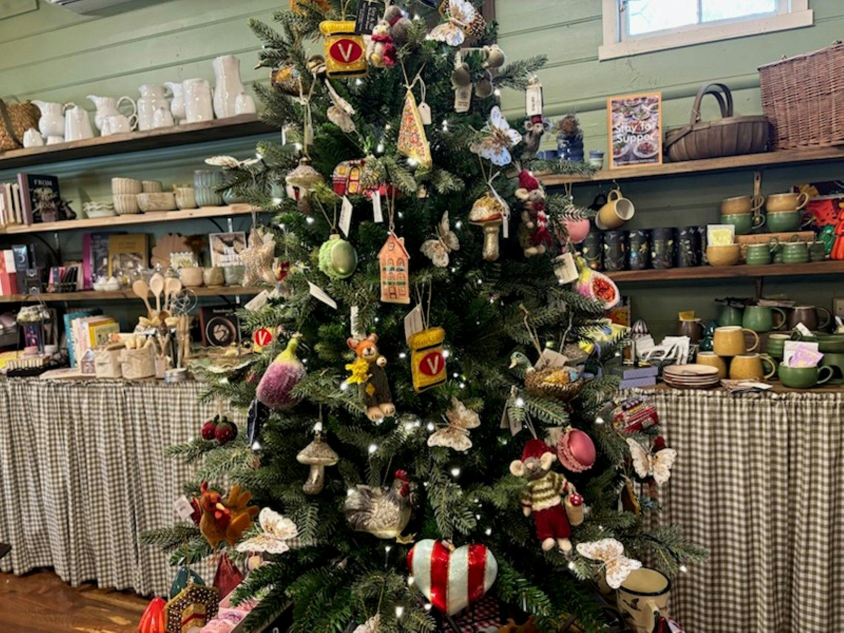 Christmas tree and other merchandise on display