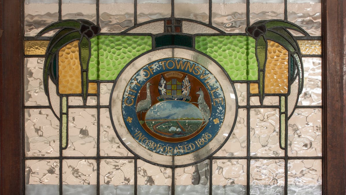 The leadlight features the Townville City crest and the city's incorporation in 1866.