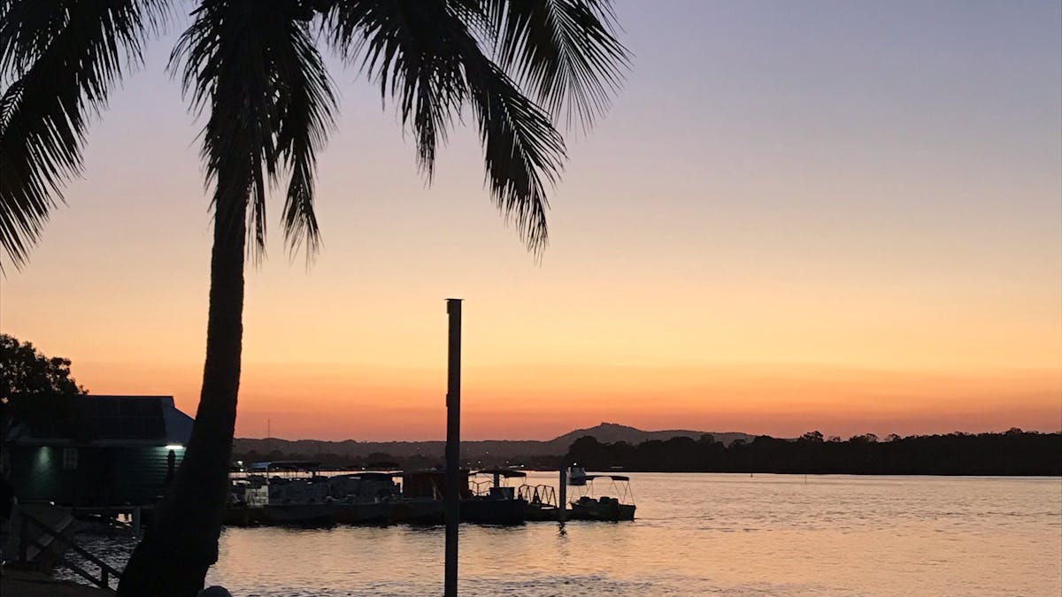 Enjoy a cold drink whilst taking in the view of the Noosa River at sunset