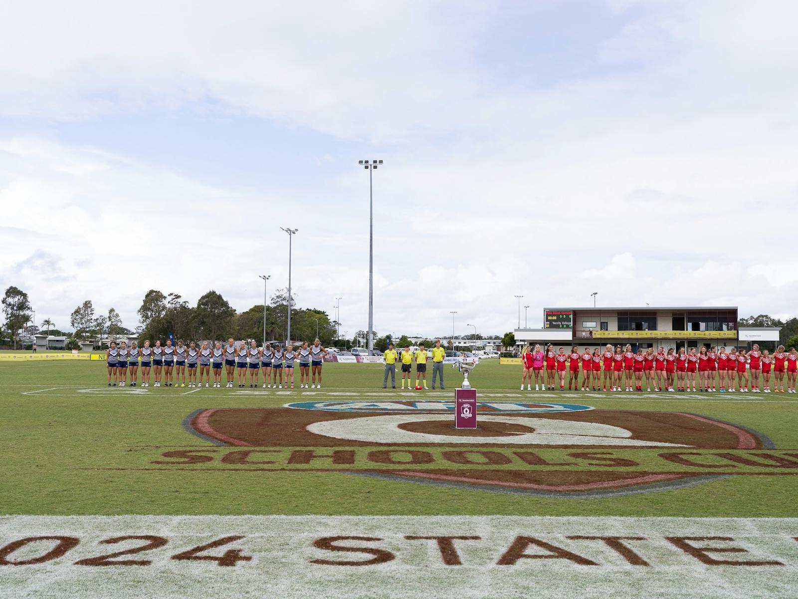 2024 Senior Female finalists line up in the pre-game ceremony in the StreetSmarts AFLQ Schools Cup