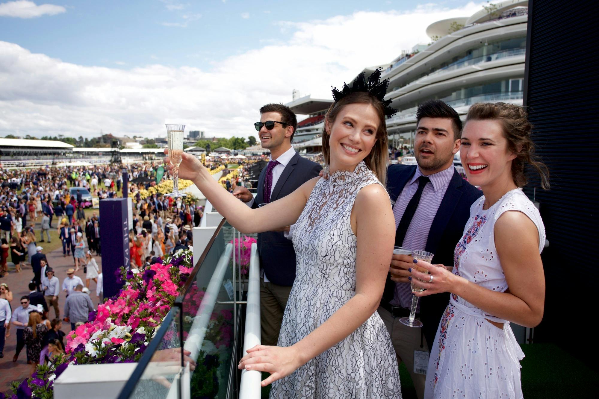 Drinks with a view as racegoers overlook the track