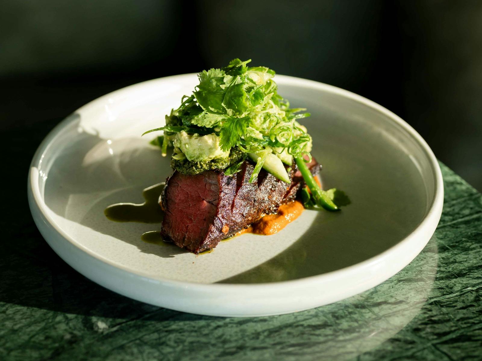 Roast Wagyu beef, avocado, jalapeño, butternut and green sauce