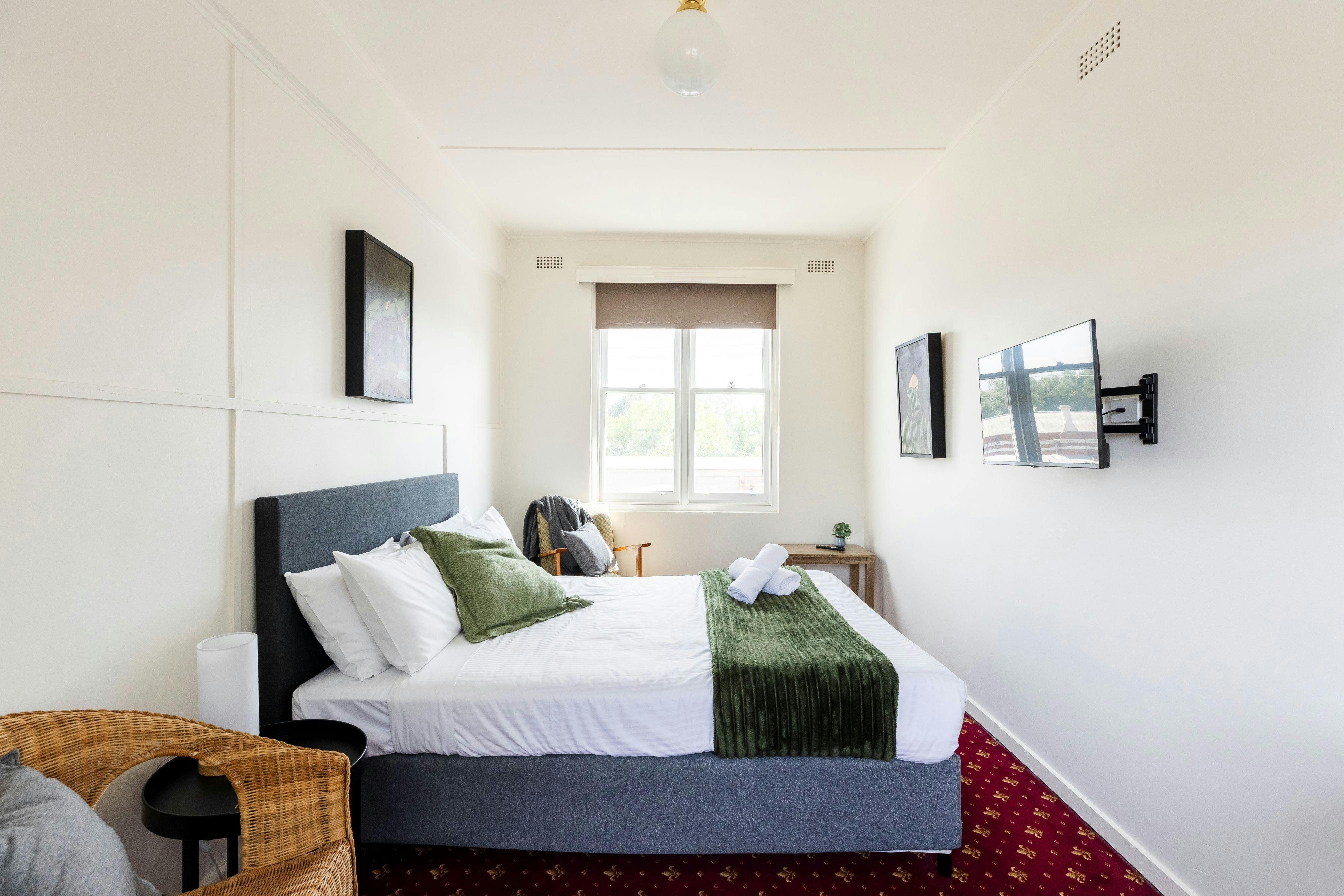 Comfortable Queen bedroom with shared bathroom facilities down the hall