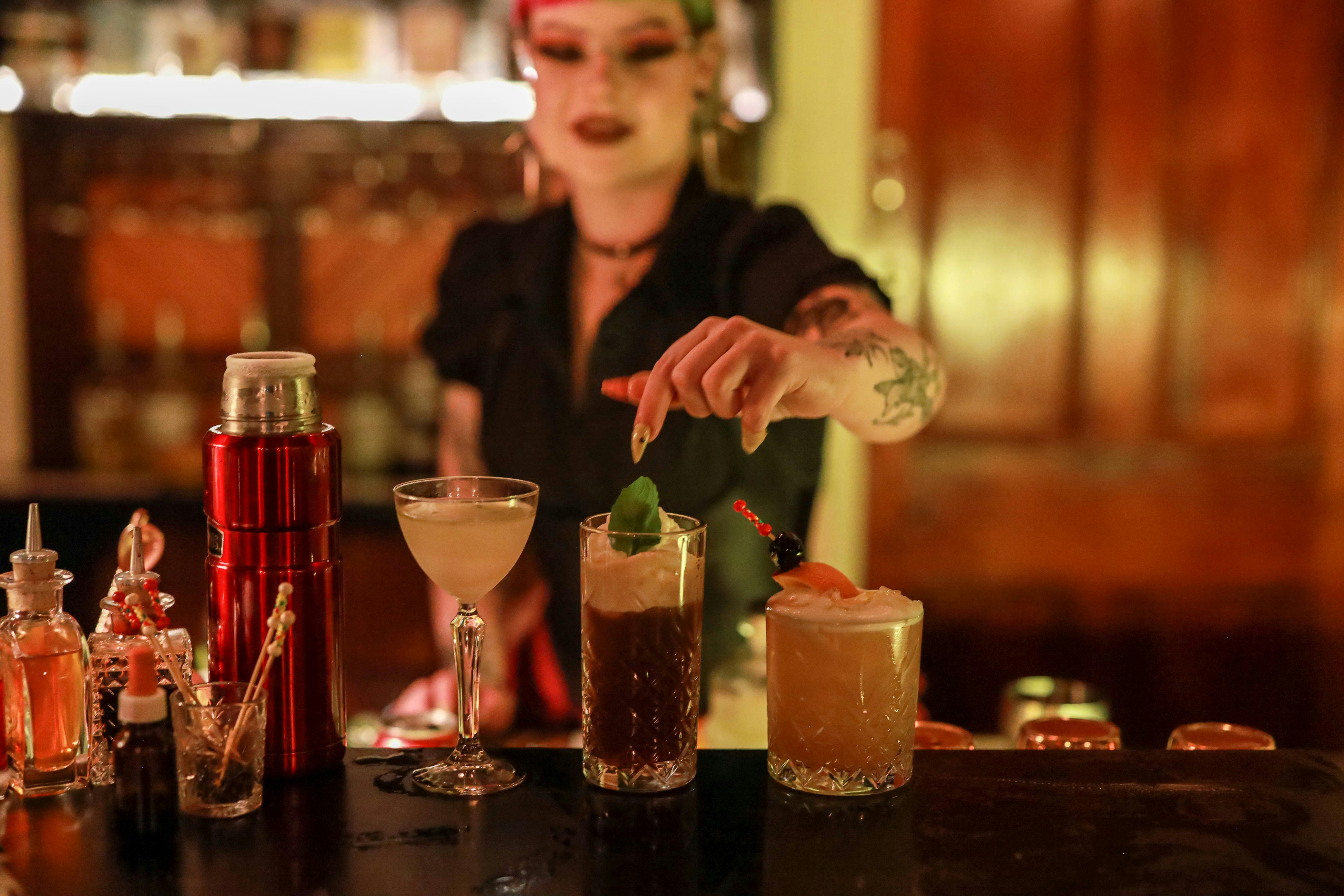 Savannah, the manager creating cocktails for guest enjoyment