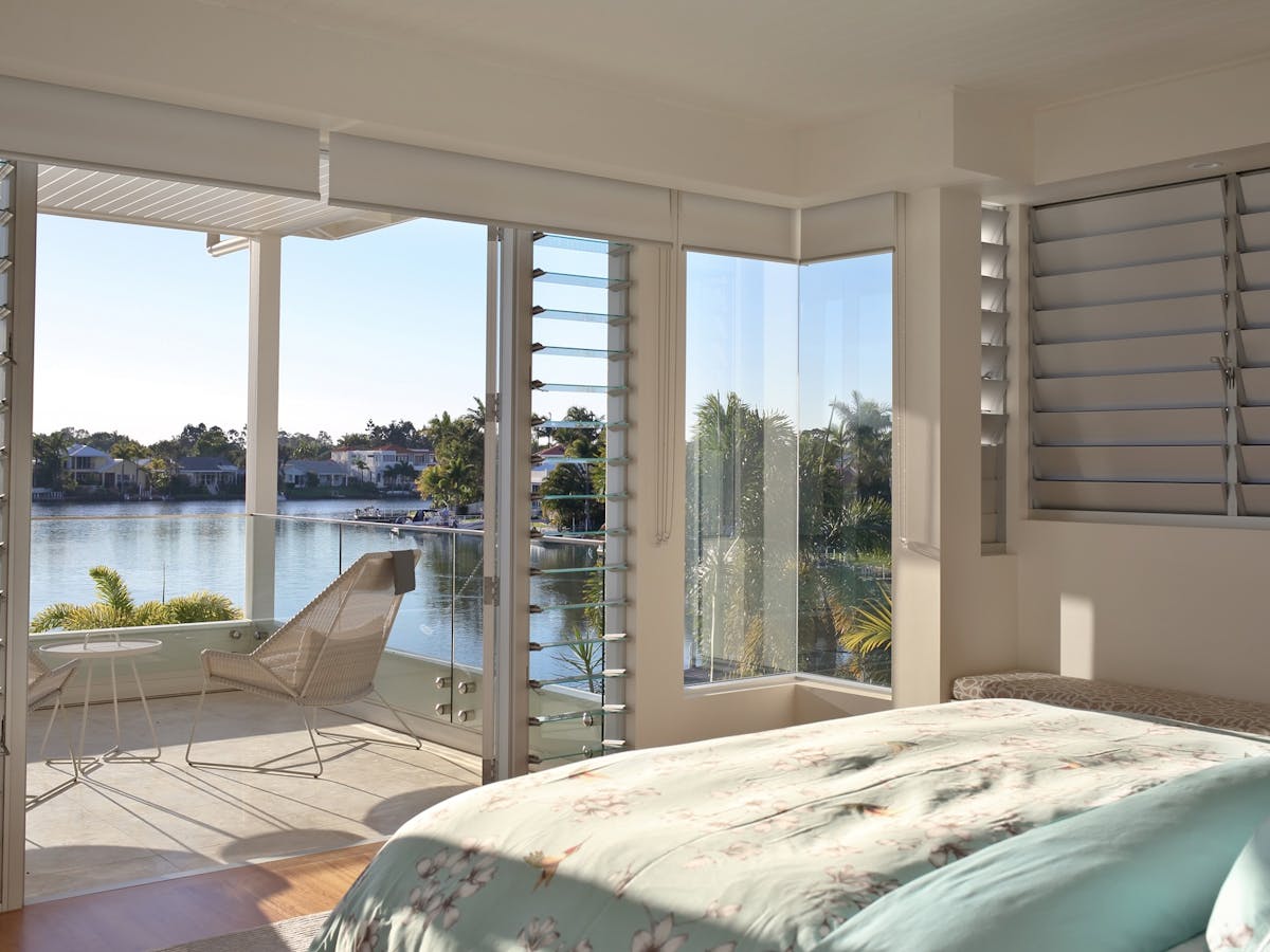 Upper level features two master suites with views, walk-in robes and ensuite bathrooms