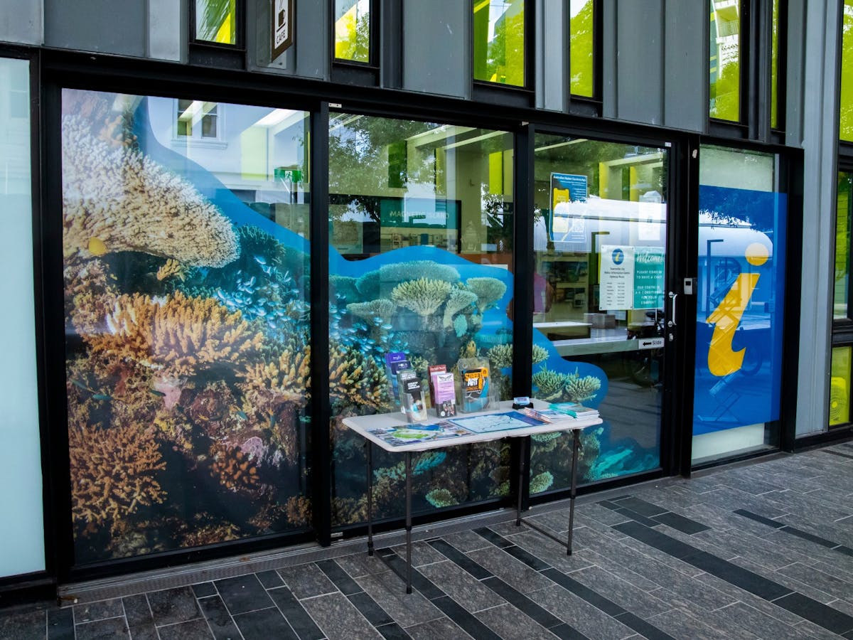 View of the outside of the centre showing a large reef image on the window View of the outside of the centre showing a large reef image on the window
