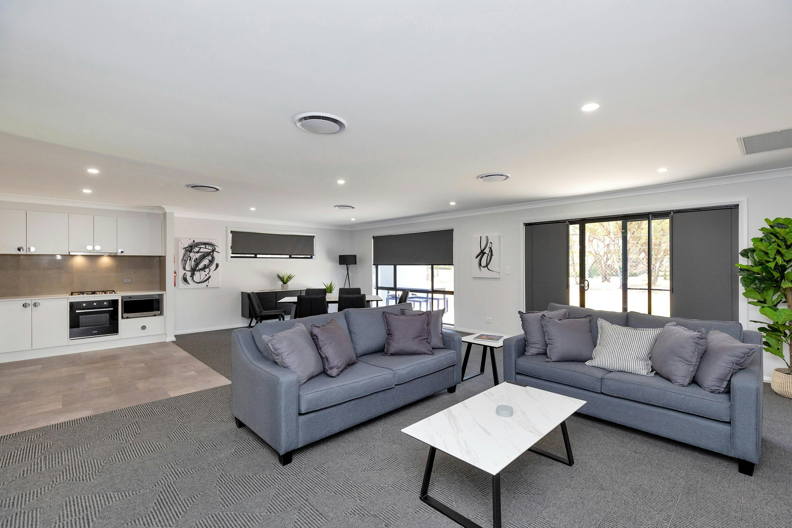 Open plan living space with full kitchen