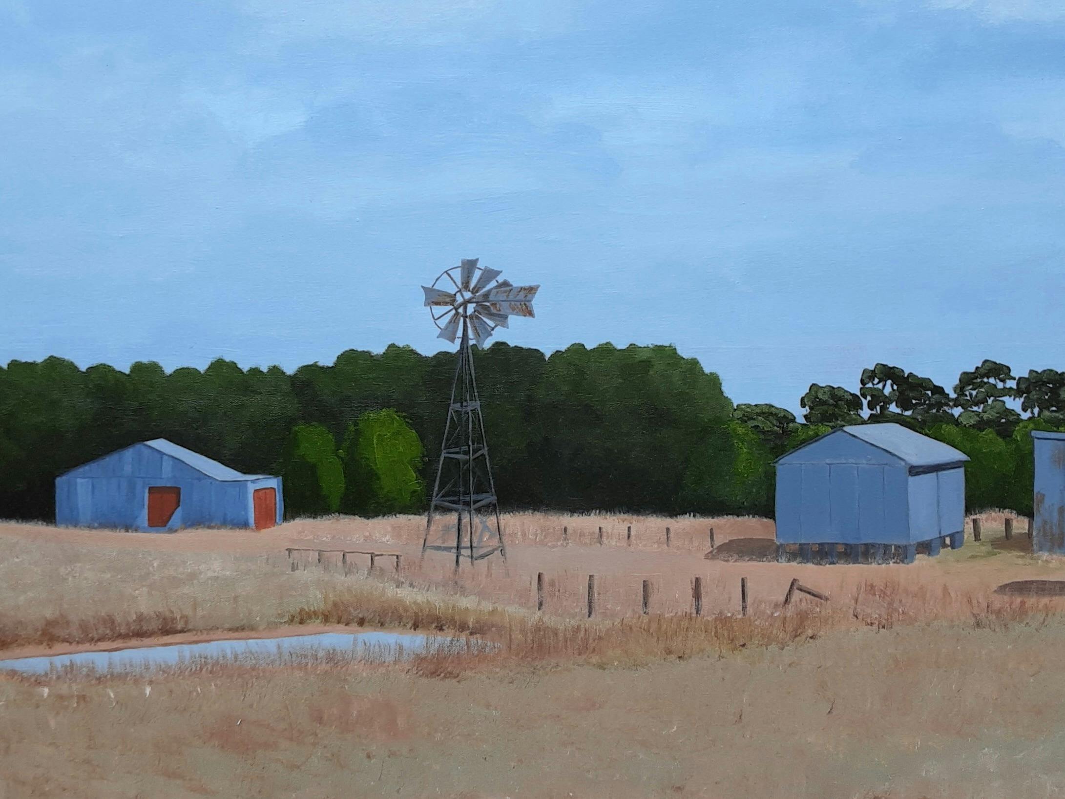 Sheds in field