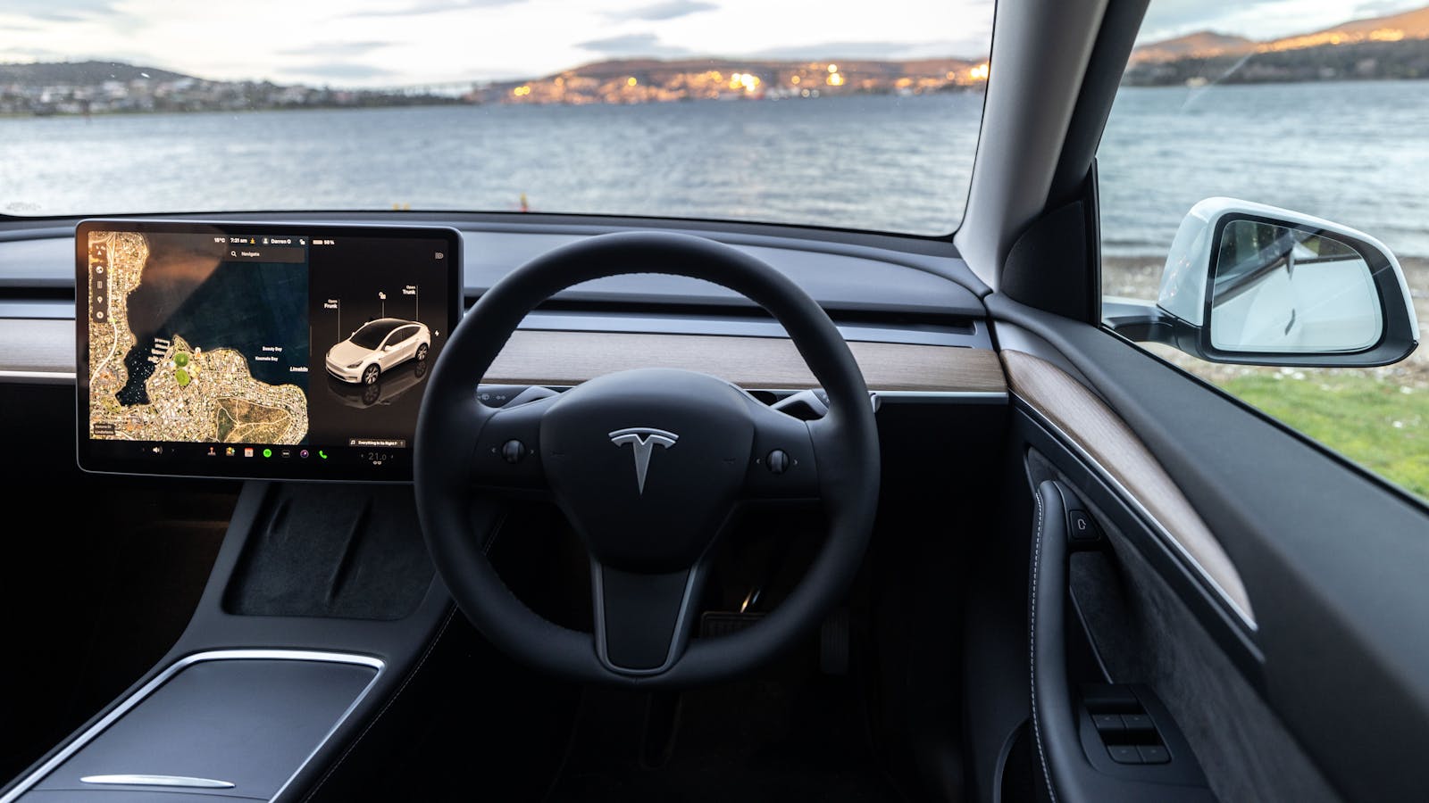 Tesla Model Y interior with heated synthetic leather seats and steering wheel, 15
