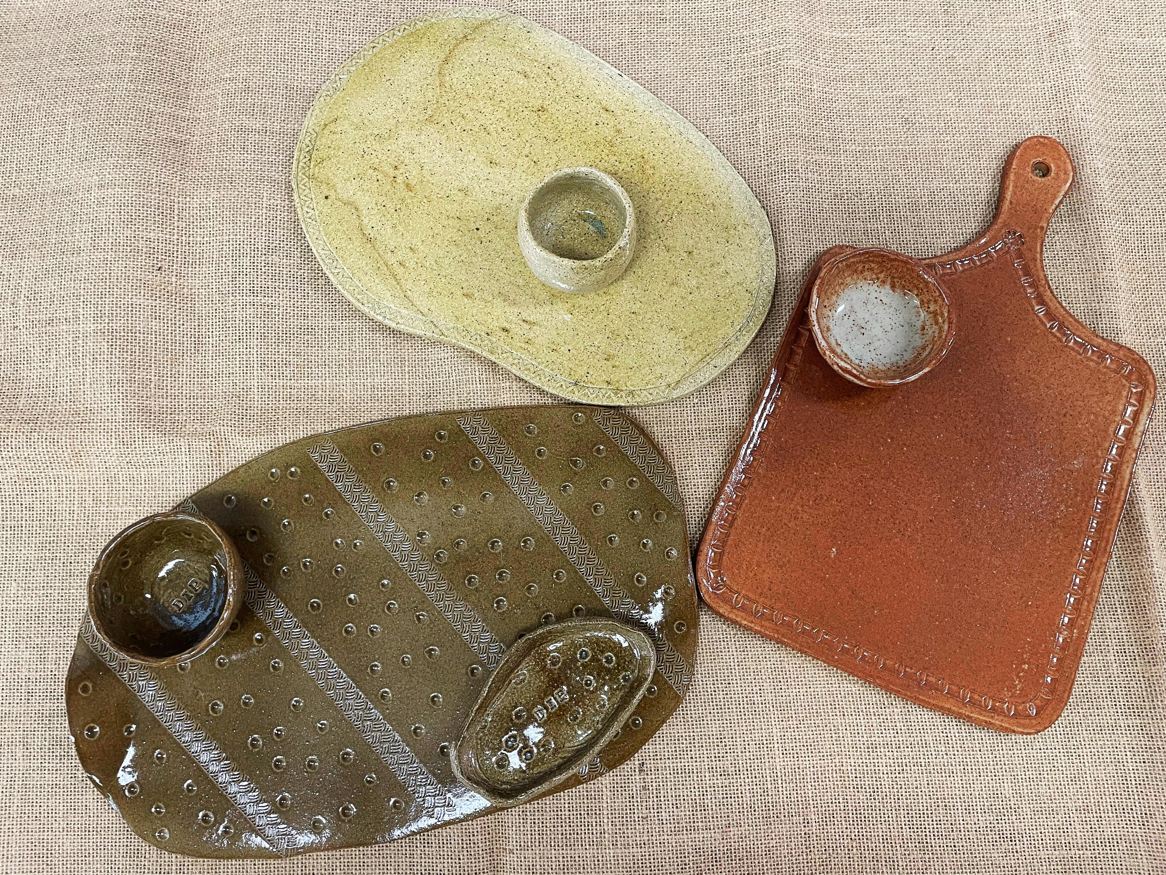 Image of a variety of hand made pottery charcuterie platters