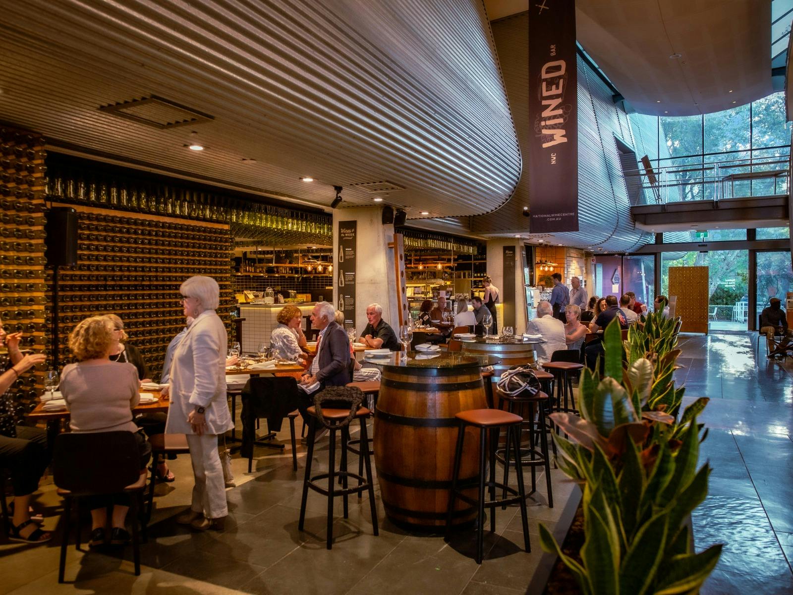 Wined Bar with guests eating and drinking wine