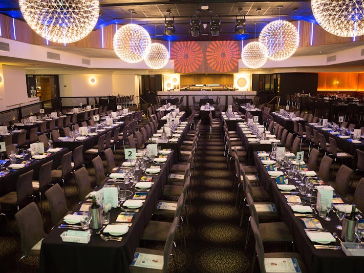 Long tables set up for a conference