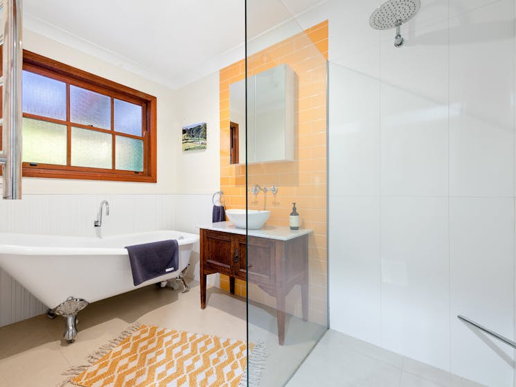 Heated towel rack and excellent shower and a bath tub too!