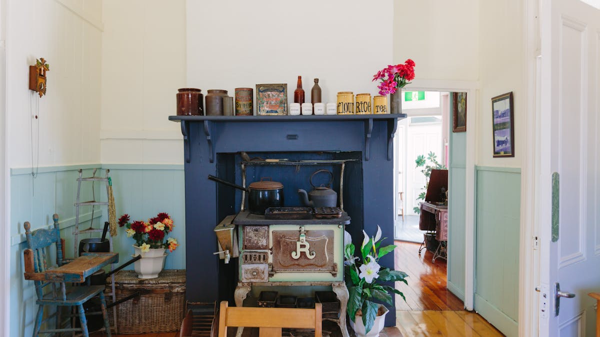 View of kitchen with brick fireplace