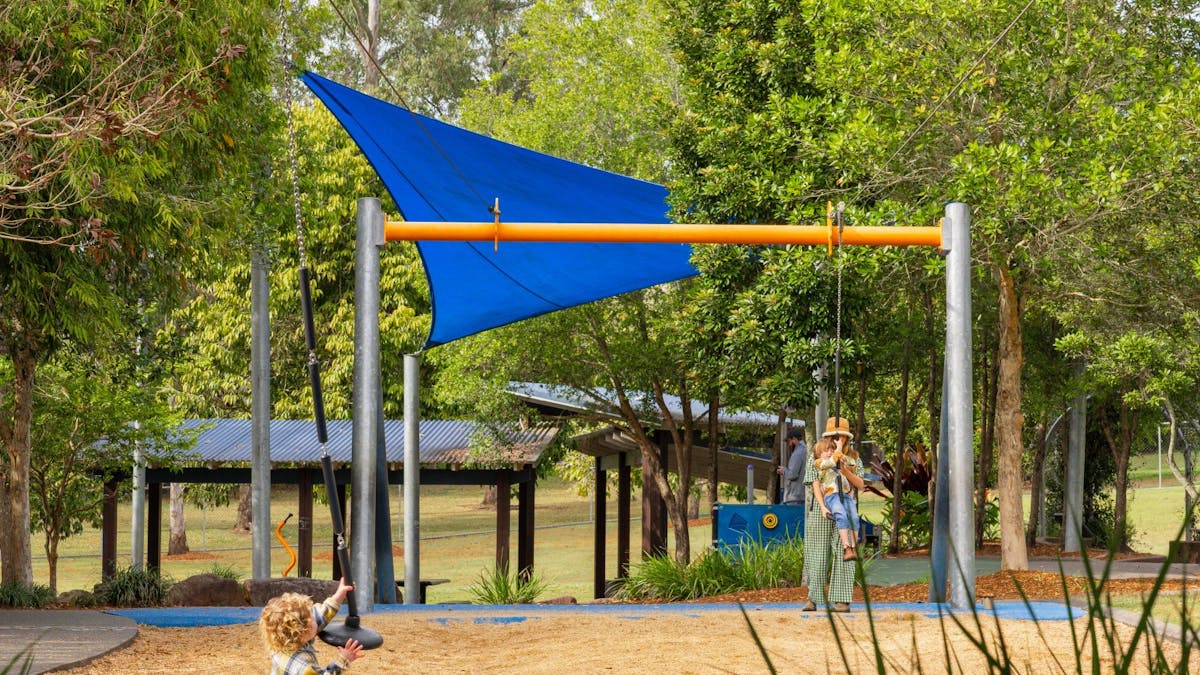 A family enjoying the playground A family enjoying the playground