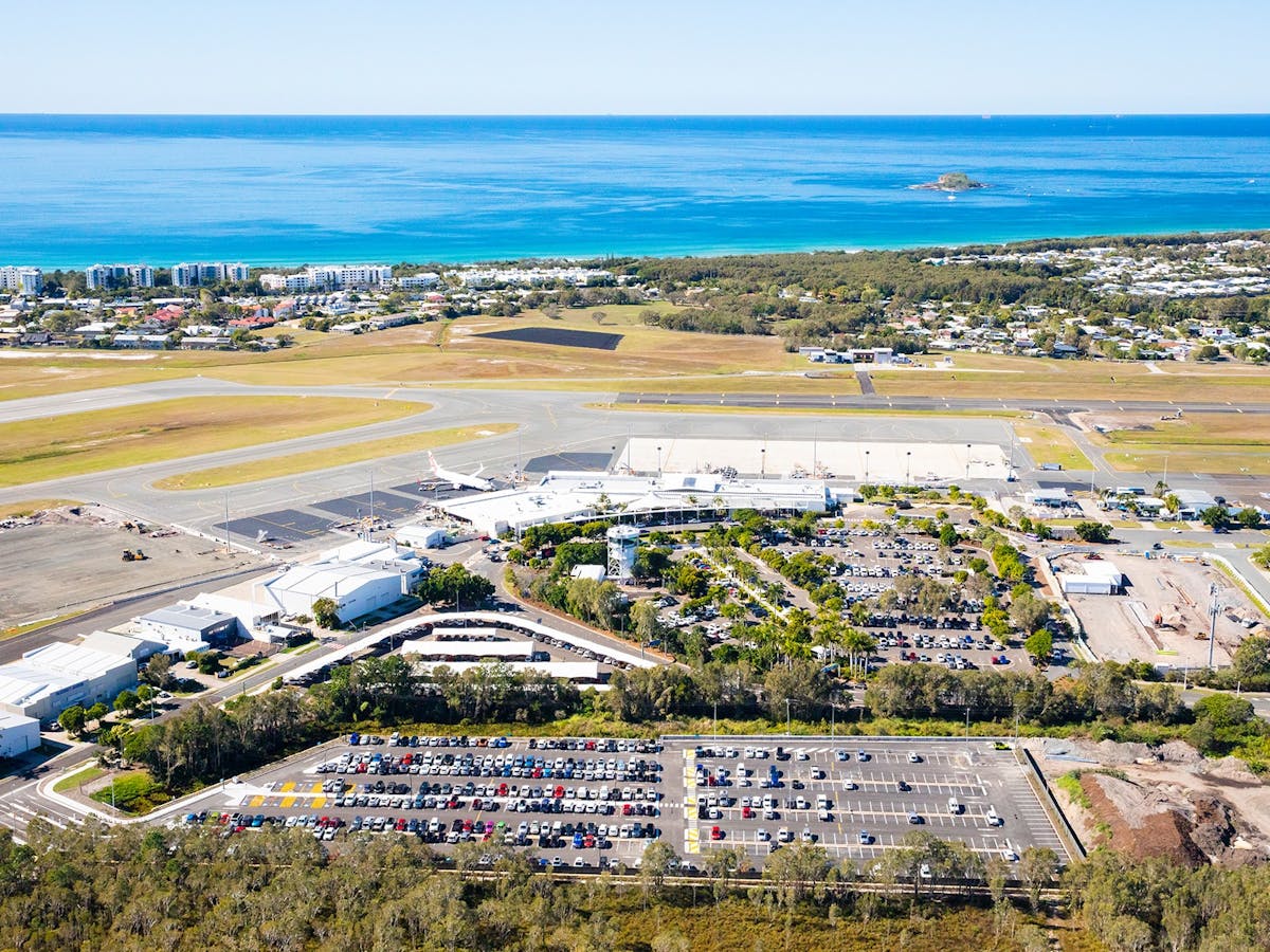 An aerial photo of Sunshine Coast Airport looking towards the ocean