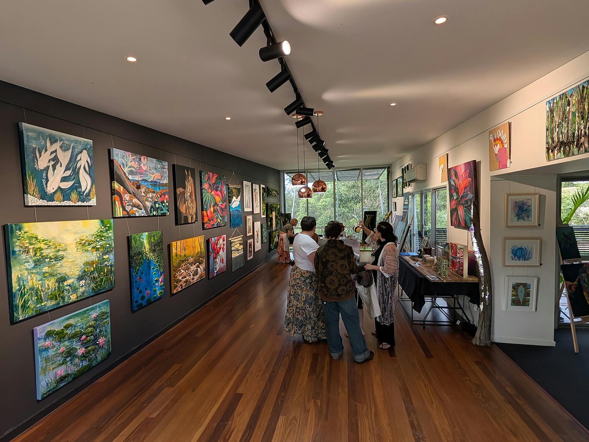 People visiting an Art Gallery People visiting an Art Gallery