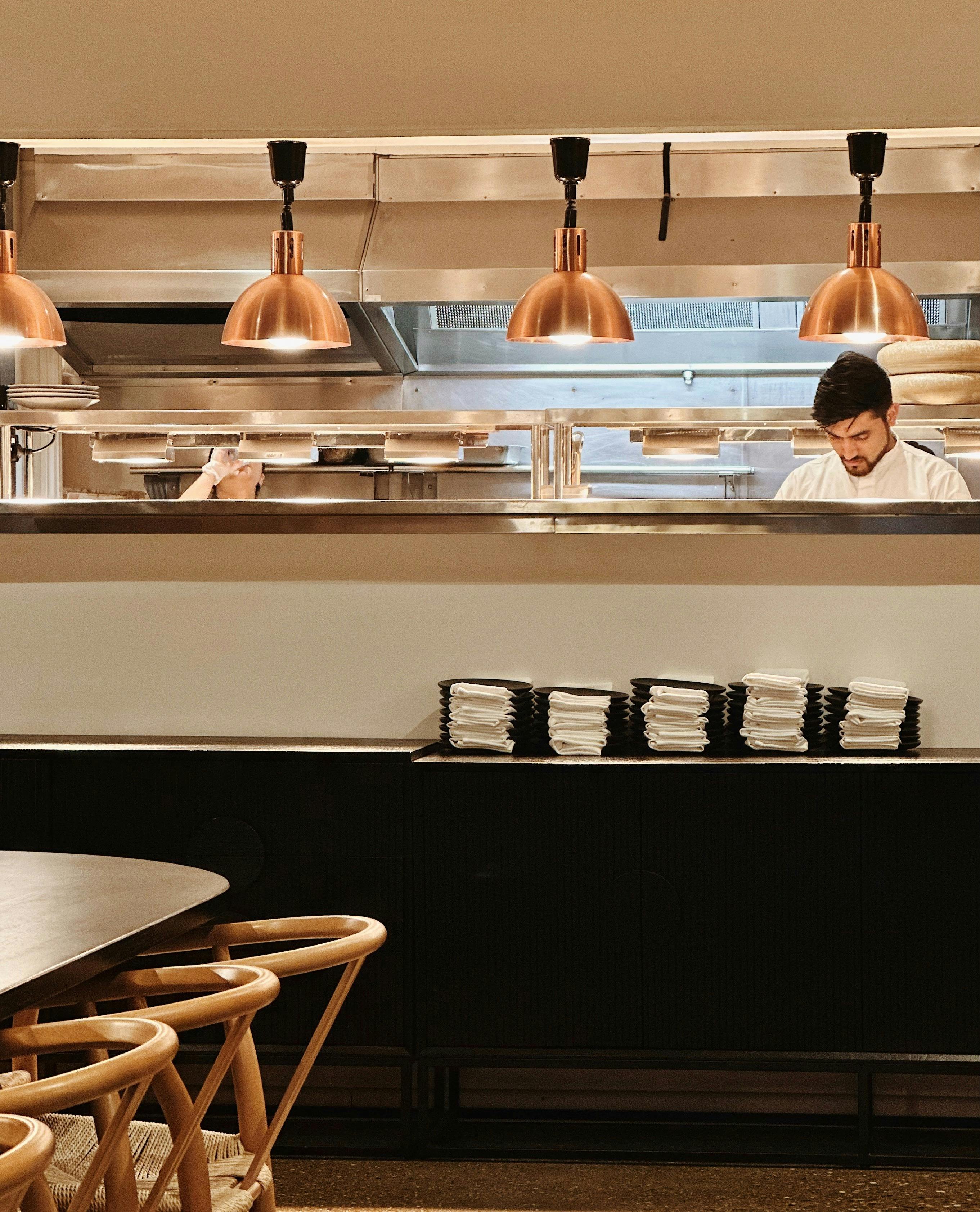 Open kitchen, watch our chefs take pride in their work
