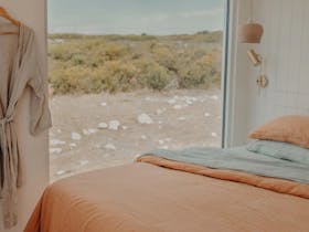 Bedroom with dressing gown and view