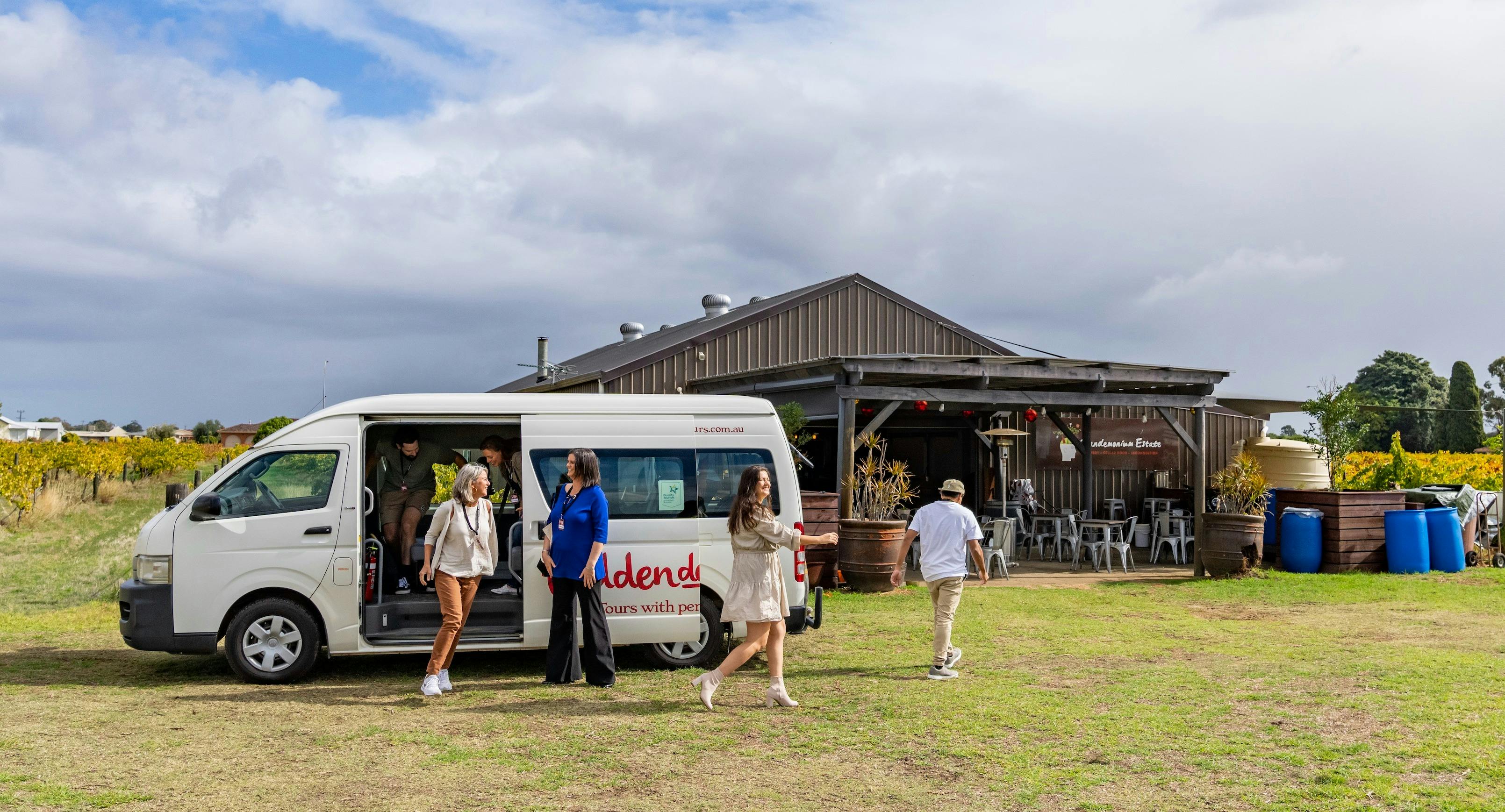 Hidden deTours Bus and guests entering a Swan Valley winery.