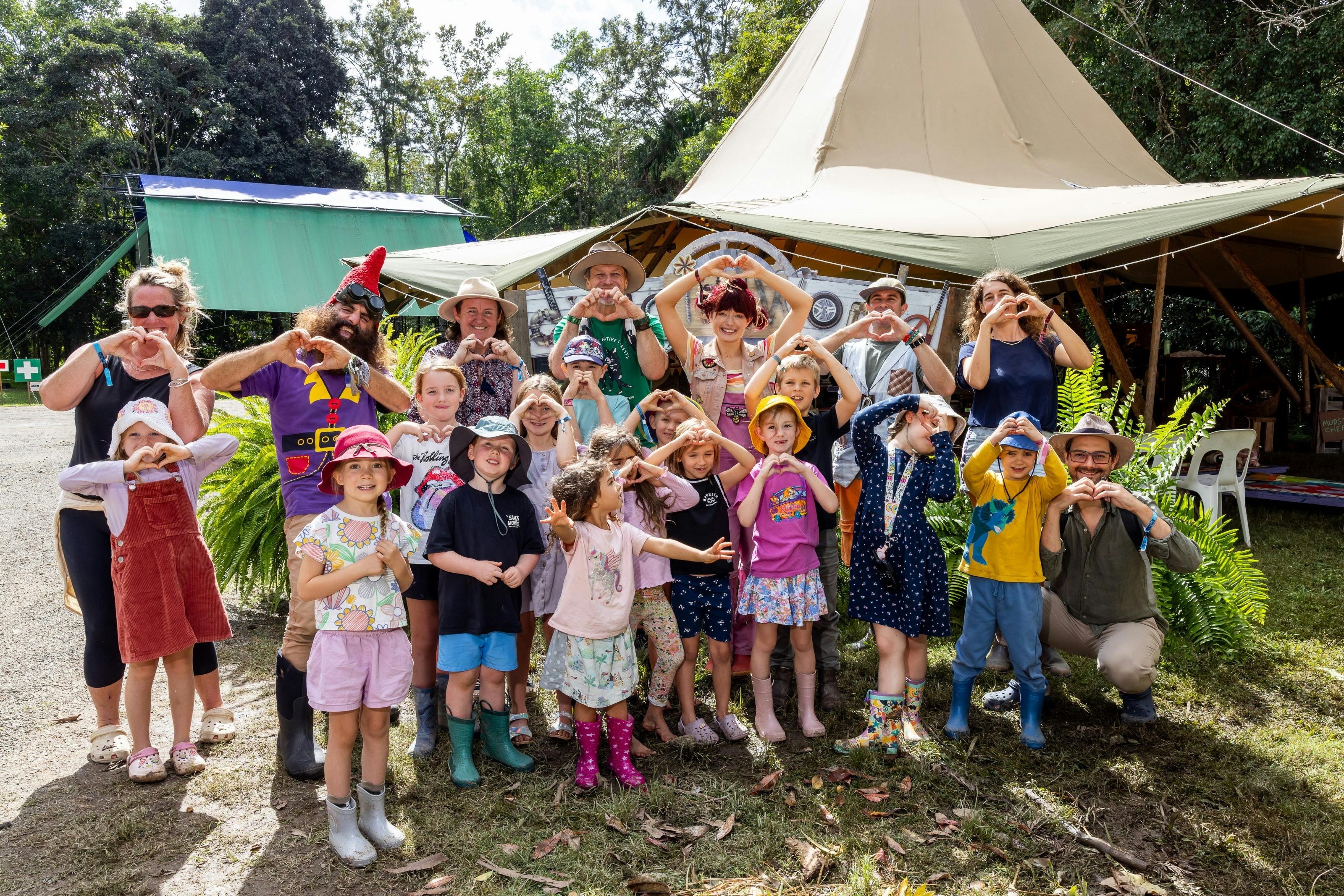 picture of a group of children learning about nature from dirtgirl and costa the gnome