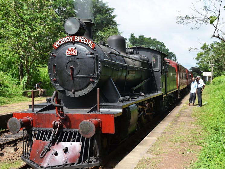The Viceroy Special Steam Train pulled into a station in Sri Lanka