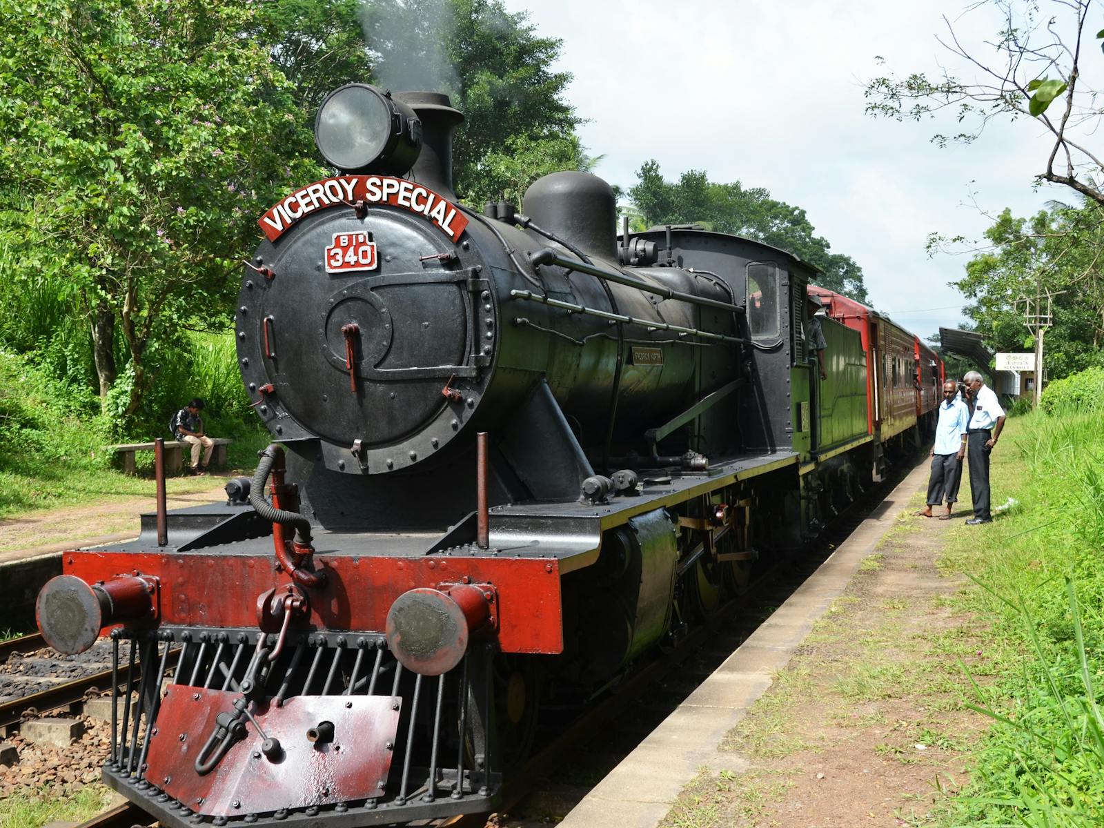 The Viceroy Special Steam Train pulled into a station in Sri Lanka