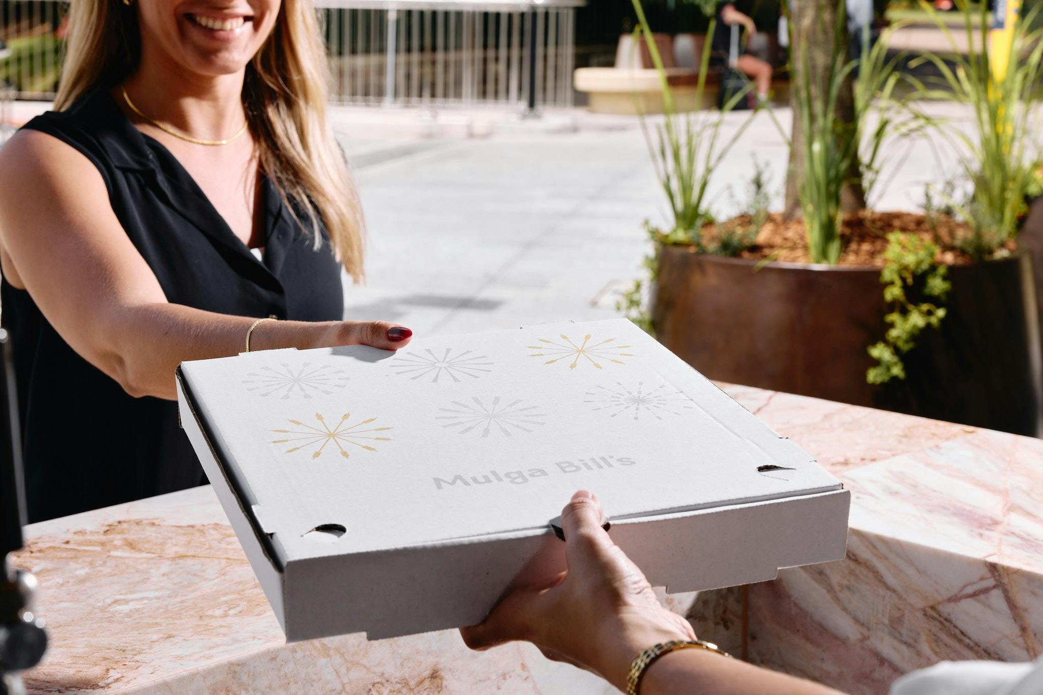 Takeaway pizza at Mulga Bill's