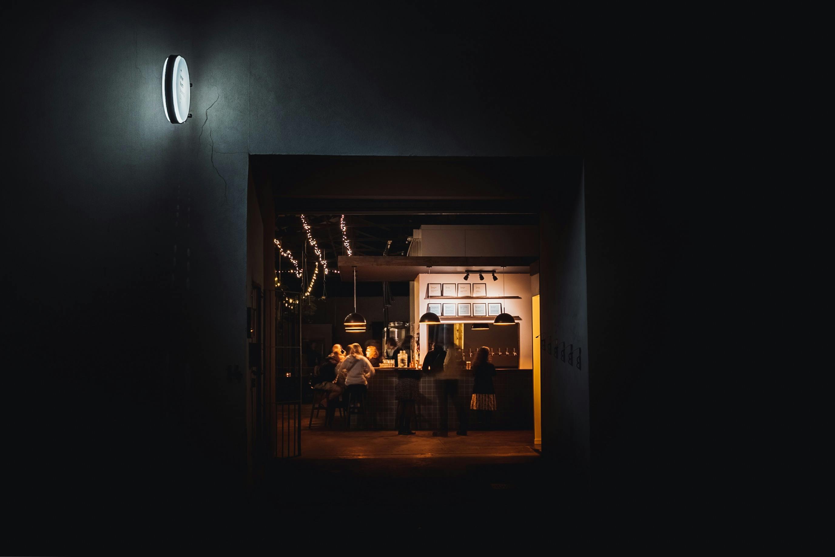 The entrance of the brewery is a surprise at the end of a dark quiet street