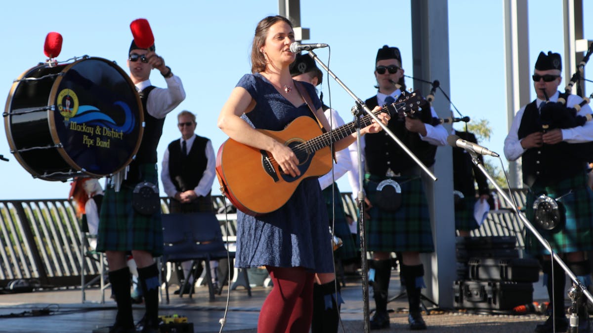Kathleen Campbell leading in the MaD Pipeband