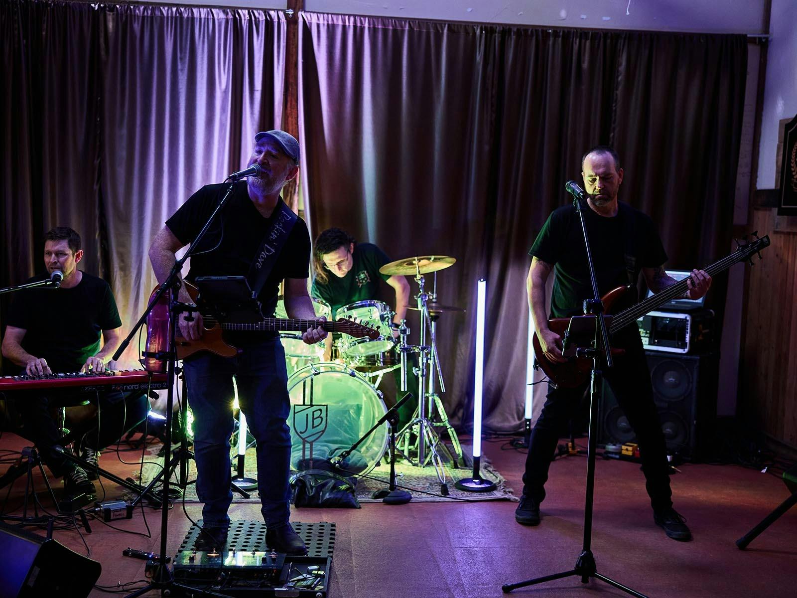 The Double Agents band performing in the Barney's band room
