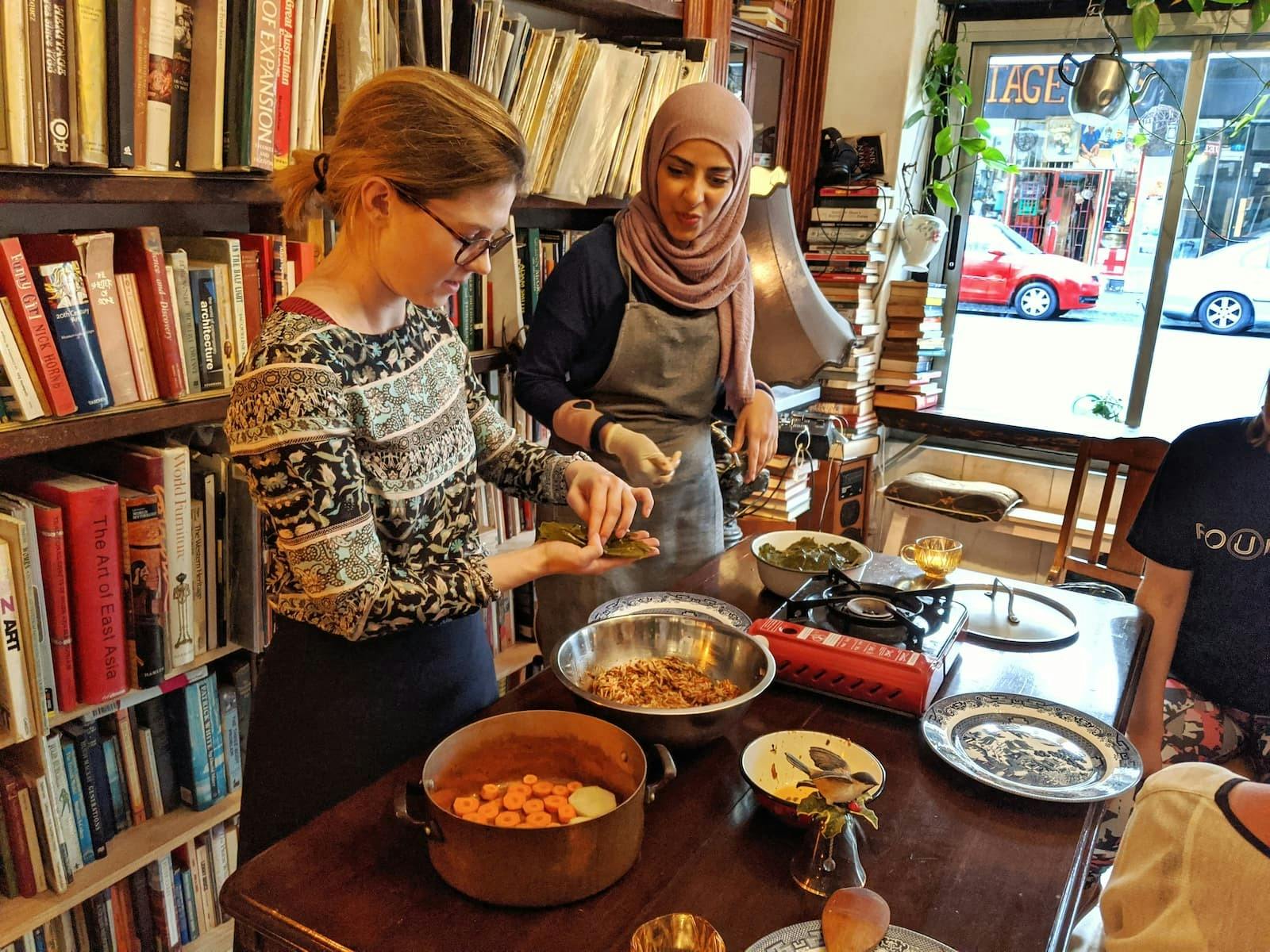 Cooking lesson at refugee chef dinner