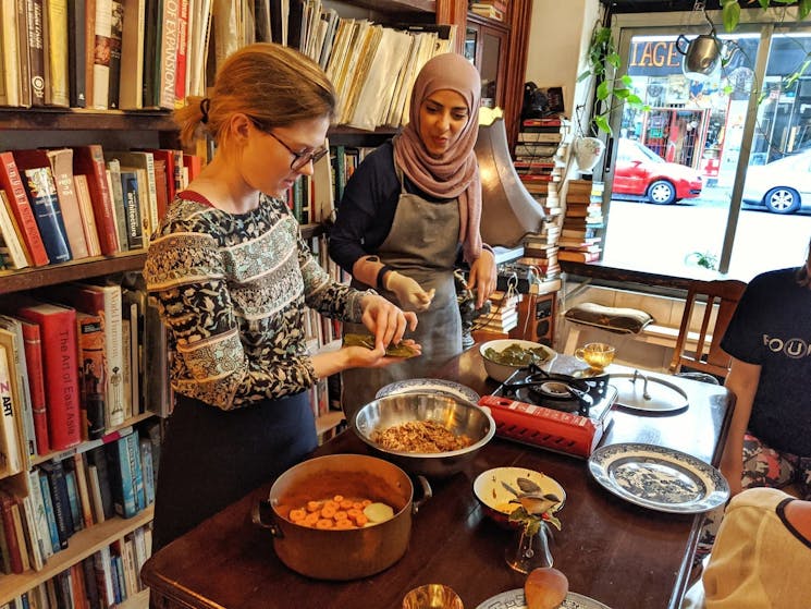 Cooking lesson at refugee chef dinner