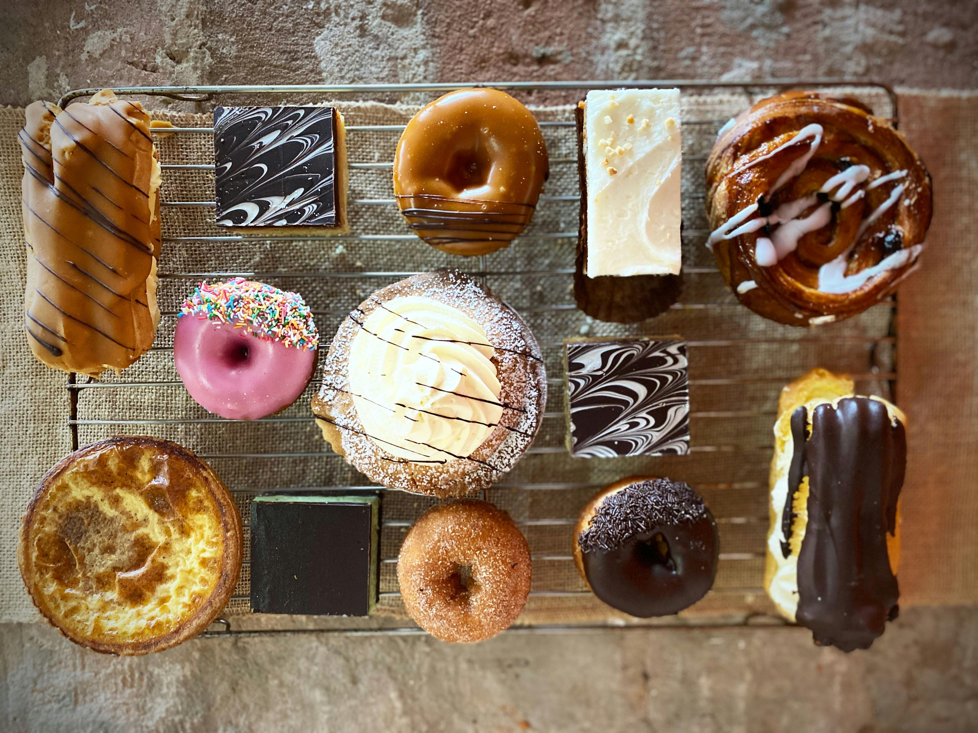trapper donuts with chocolate eclairs and apple pies