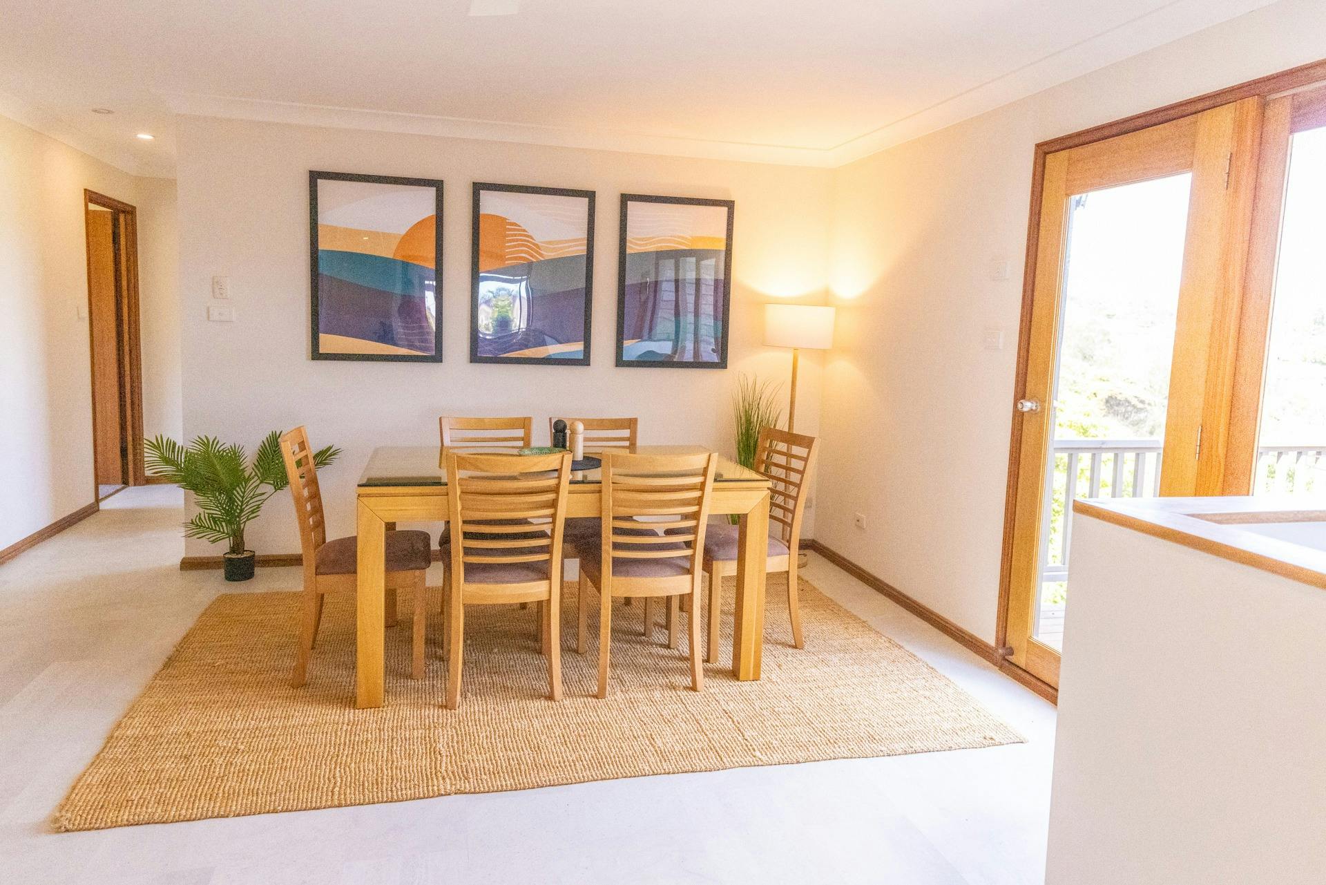 Enjoy a choice of dining areas,  a table for 6 with door leading to an outdoor BBQ setting.