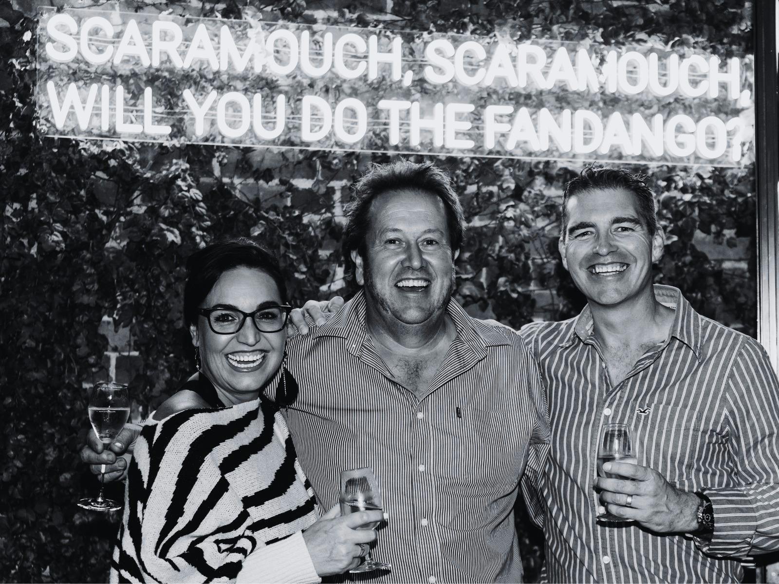 Two guests and a winemaker gather at the Victoria Rutherglen