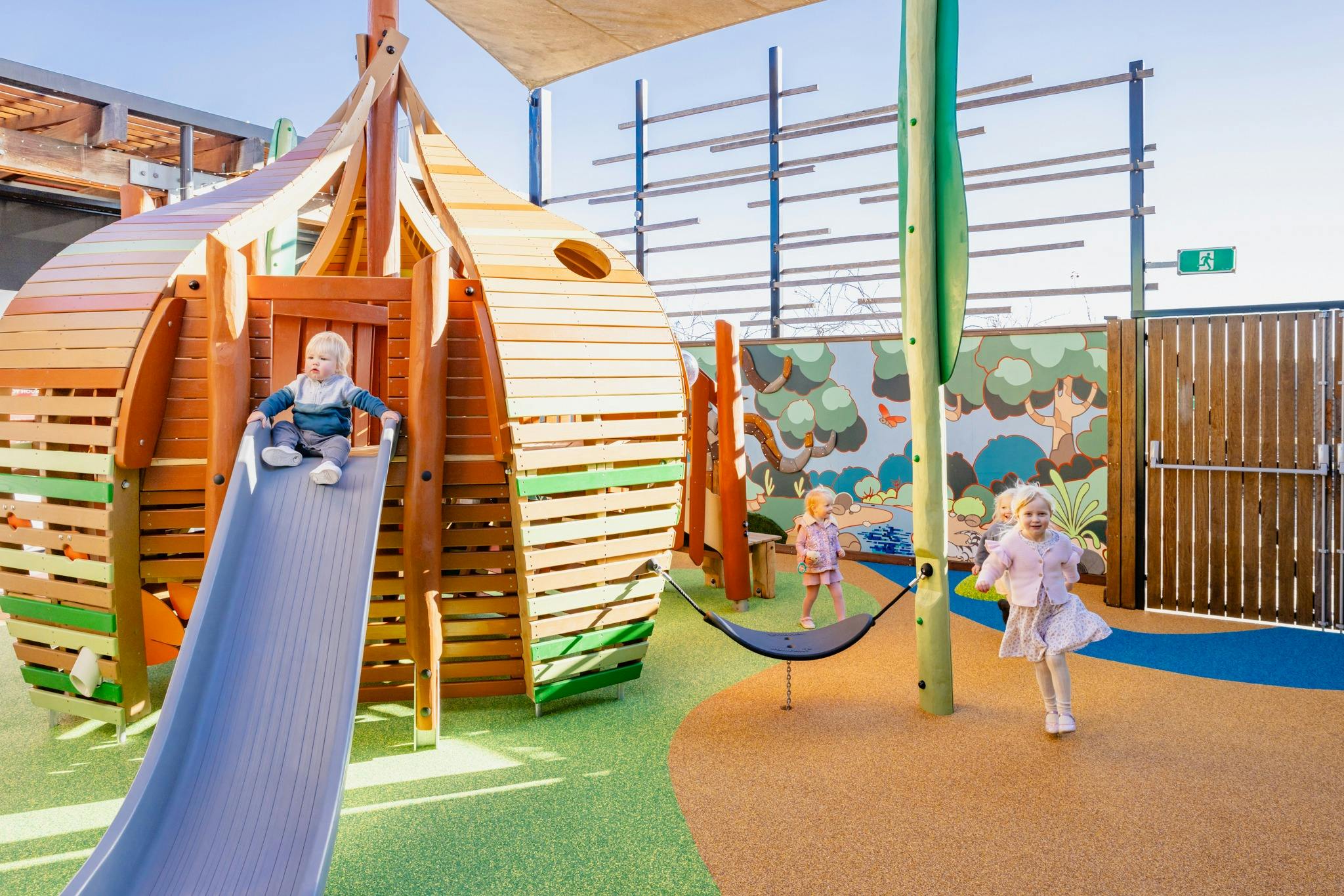 children playing on the playworld